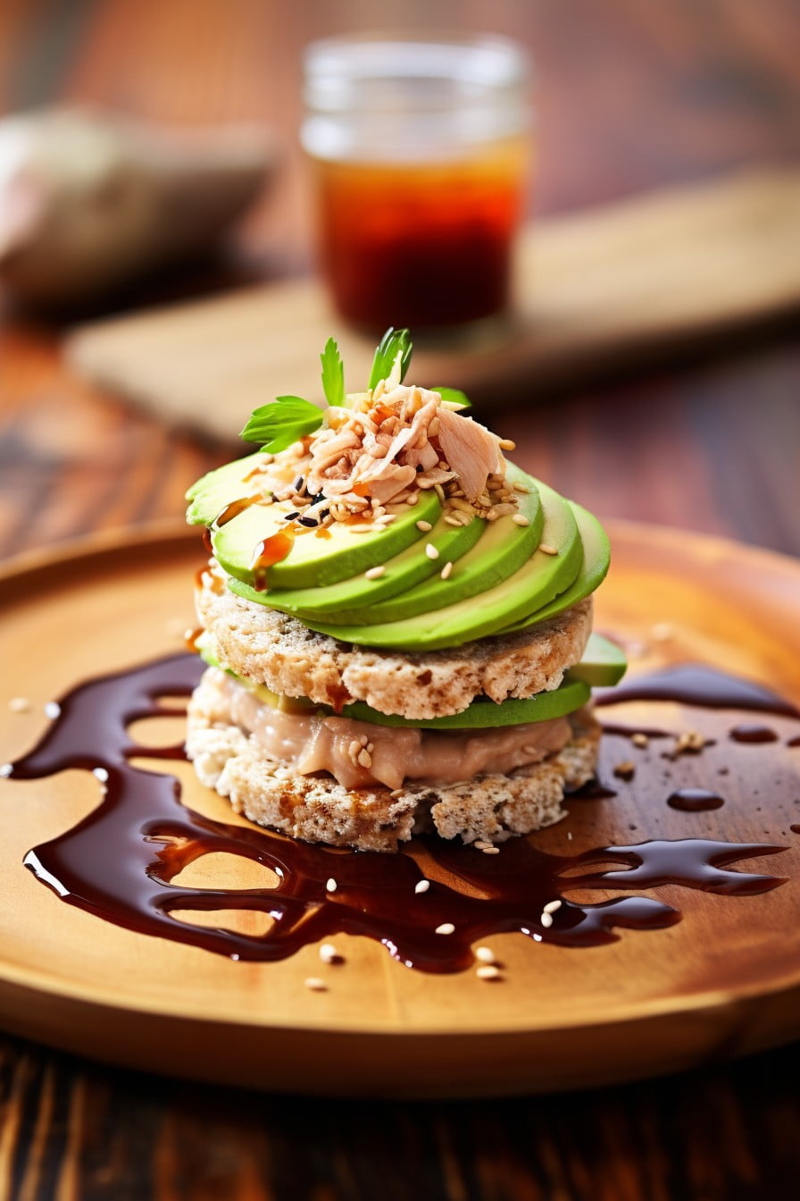 rice cake topped with tuna and avocado