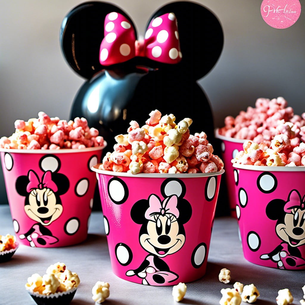 pink popcorn in minnie themed cups