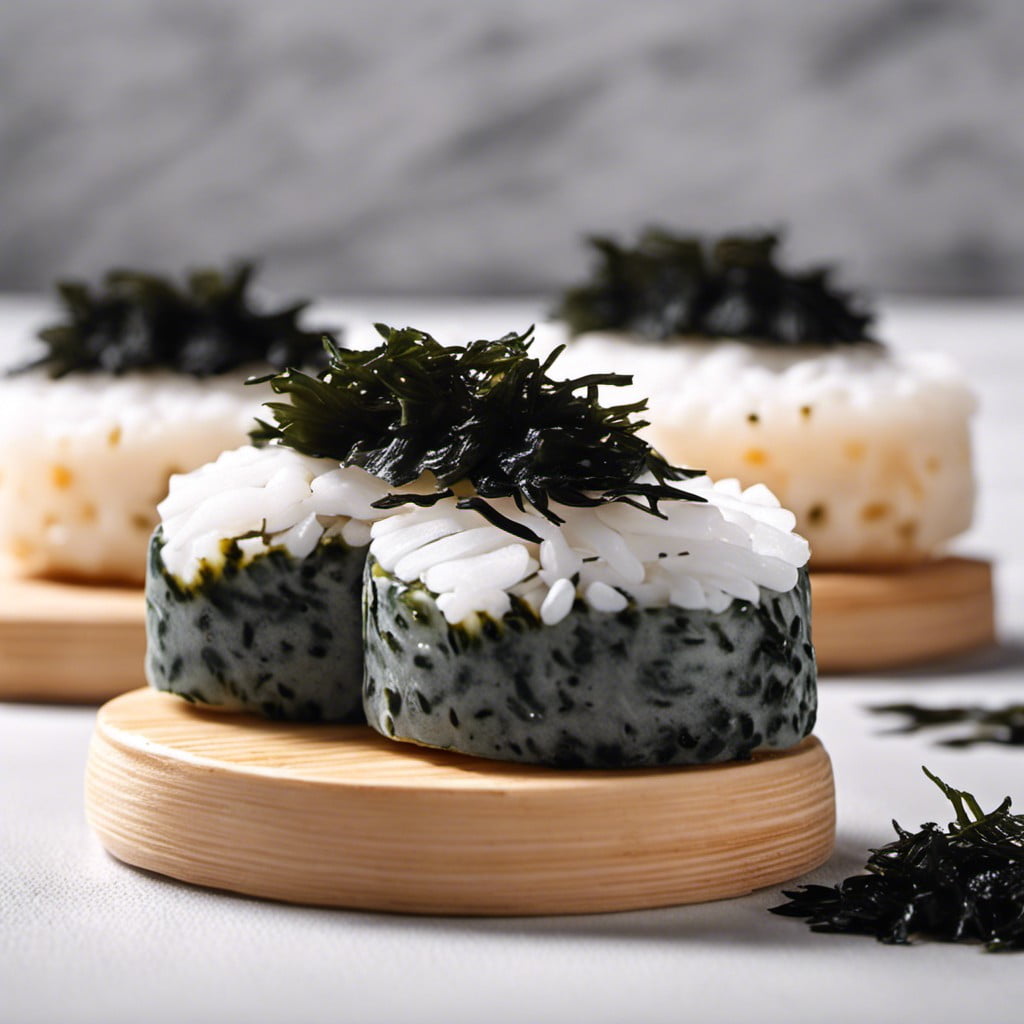 white rice cakes with black seaweed topping