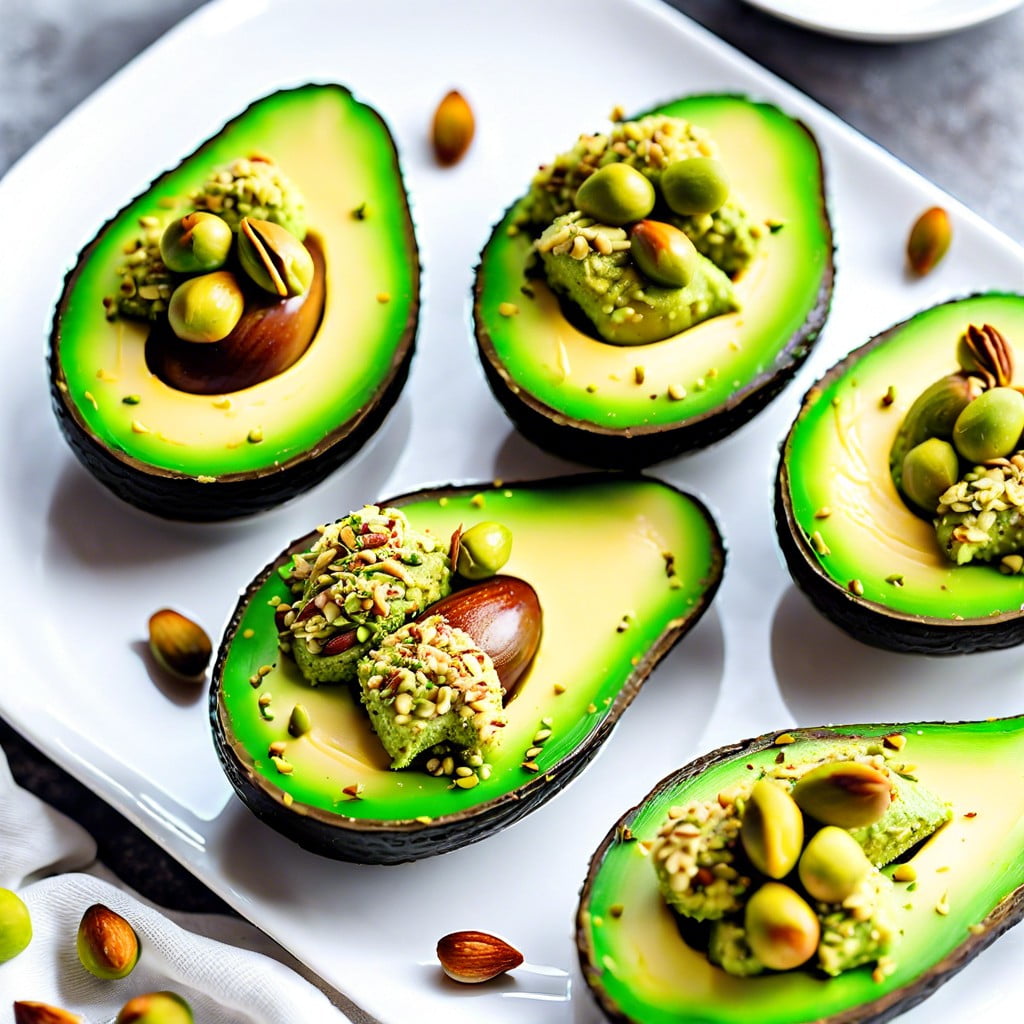 avocado slices dipped in crushed pistachios