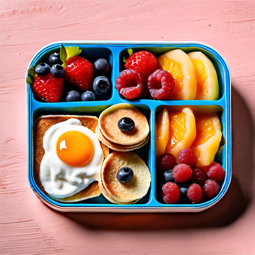 breakfast bento mini pancakes fruit salad yogurt and honey