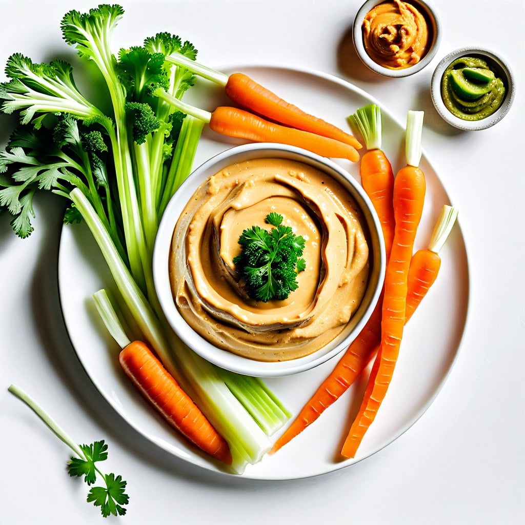 carrot and celery sticks with hummus