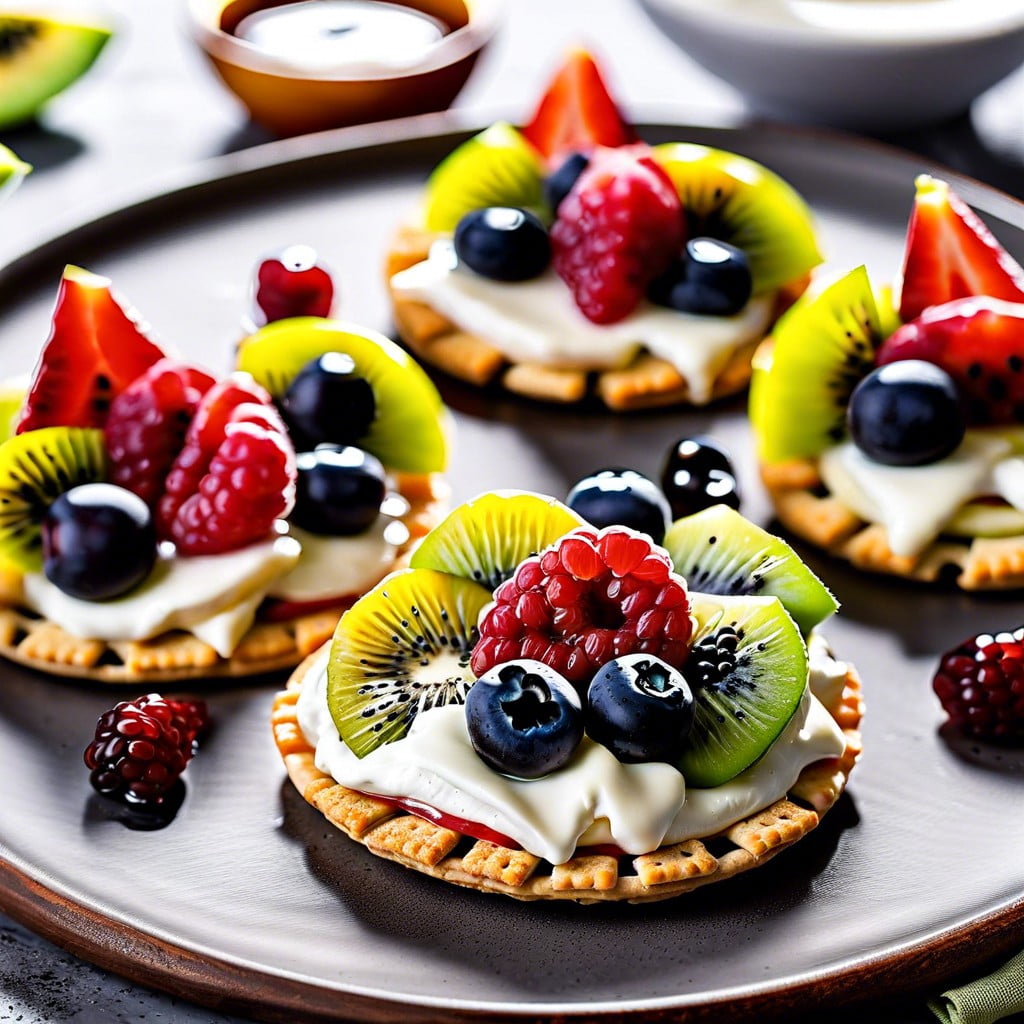 mini fruit pizzas using round crackers cream cheese and colorful fruit slices
