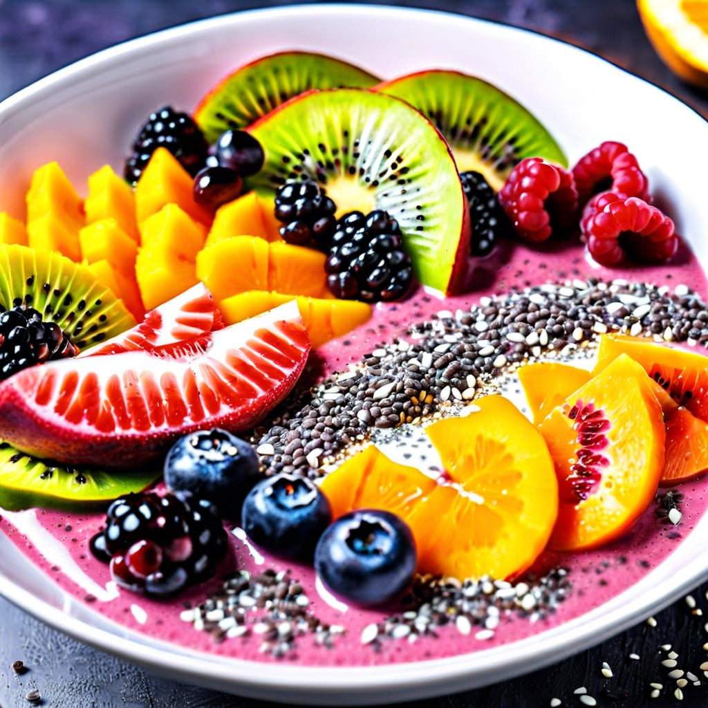 smoothie bowl topped with sliced fruits and chia seeds