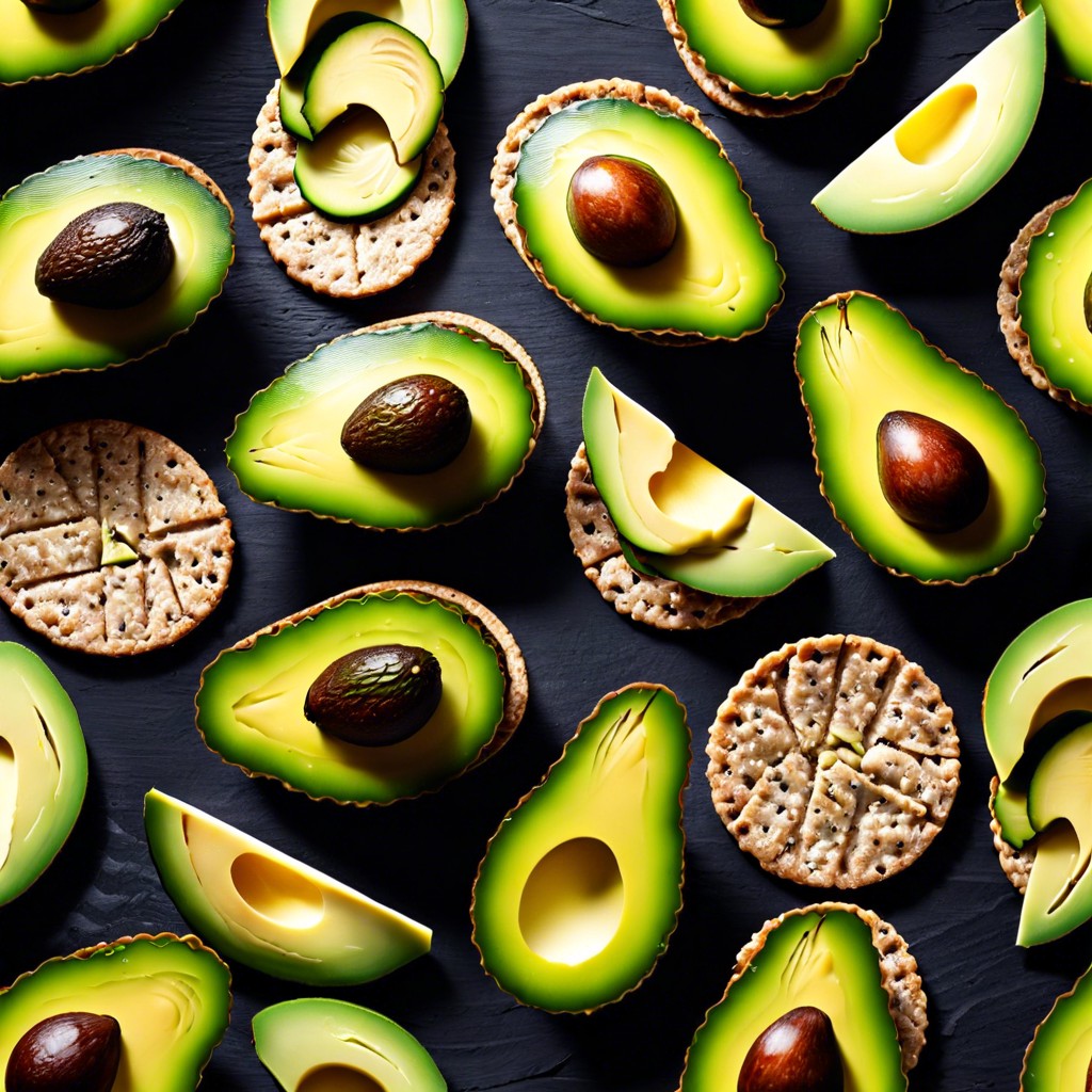 avocado slices on multigrain crackers