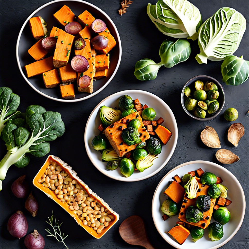 baked tempeh with sweet potato cubes and brussels sprouts