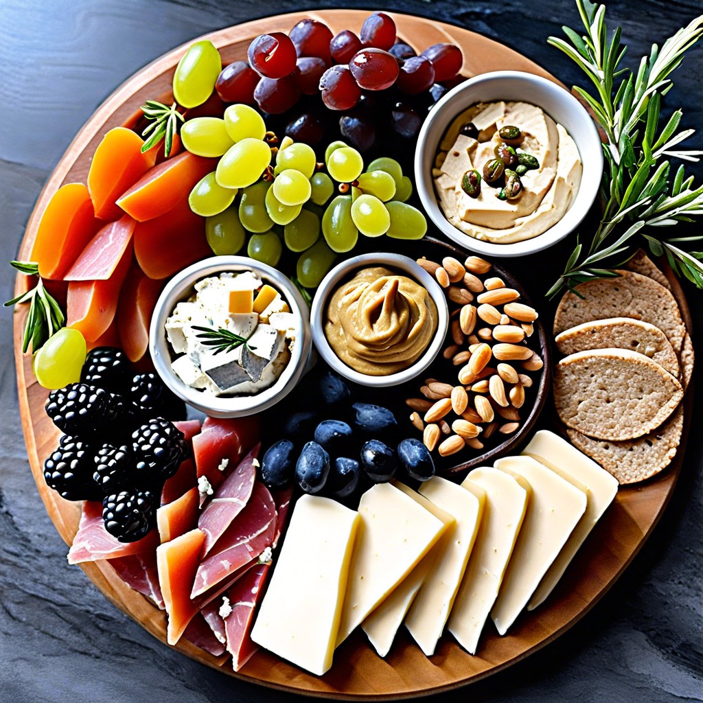 mediterranean board featuring hummus dolmas and feta cheese