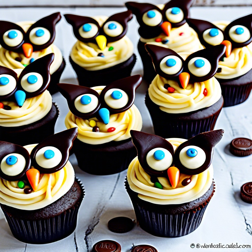 owl cupcakes decorated with oreos and mampms for eyes