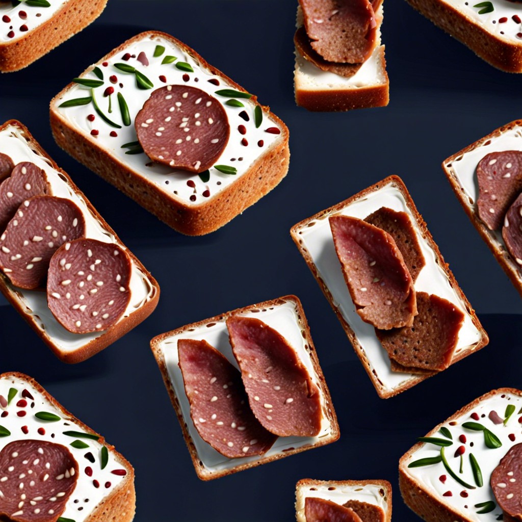 rye bread squares with pastrami and mustard